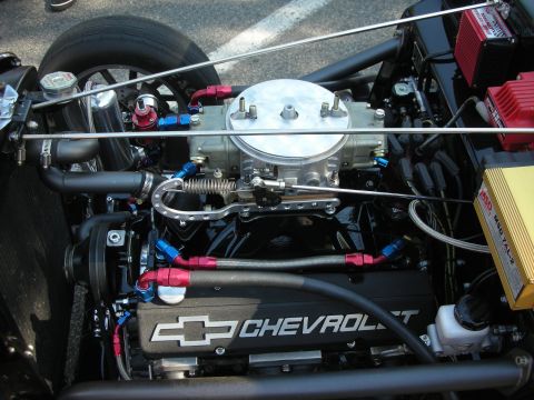 1998 Ford Crown Victoria - The engine bay features a Chevrolet engine with custom fuel lines and an MSD ignition system.