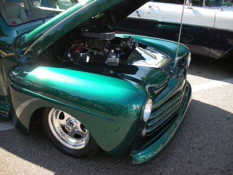 1998 Ford Crown Victoria - Custom 1948 Ford F1 pickup truck with a detailed engine bay and shiny green paint.