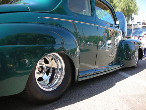 1998 Ford Crown Victoria - Custom hot rod with a unique green paint job and chrome wheels.