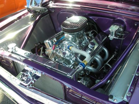 1998 Ford Crown Victoria - Customized V8 engine bay with polished chrome components and purple paint accents.