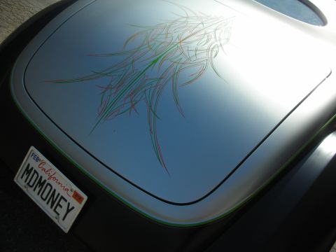 1998 Ford Crown Victoria - A California license plate is visible on the trunk of a car custom pinstripe artwork.