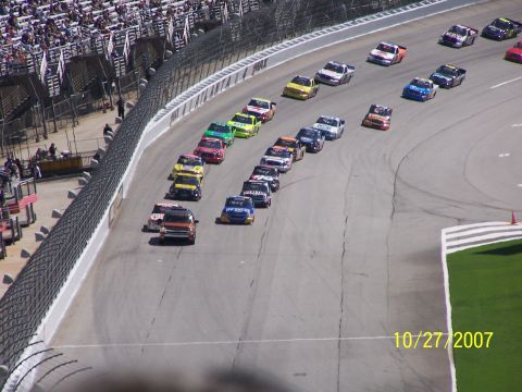 1979 Ford F-150 - A pack of stock cars races around a track on October 27, 2007.