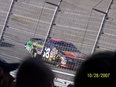 1979 Ford F-150 - A race car with the number 58 and numerous sponsor decals is seen on the track, with a date stamp of 10/28/2007.