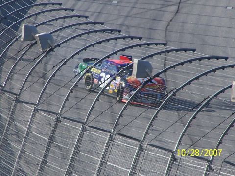 1979 Ford F-150 - A race car speeds around a track, captured on October 28, 2007.