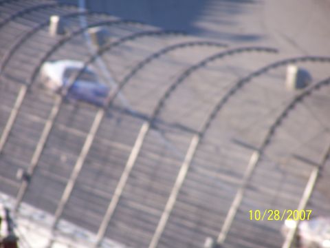 1979 Ford F-150 - A race car is seen on a track under a large canopy structure, with the date 10/28/2007 visible.