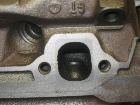 1900 Ford Wagon - F3ZE (GT-40 Iron) exhaust port with funny indentation where smog bump would have been.