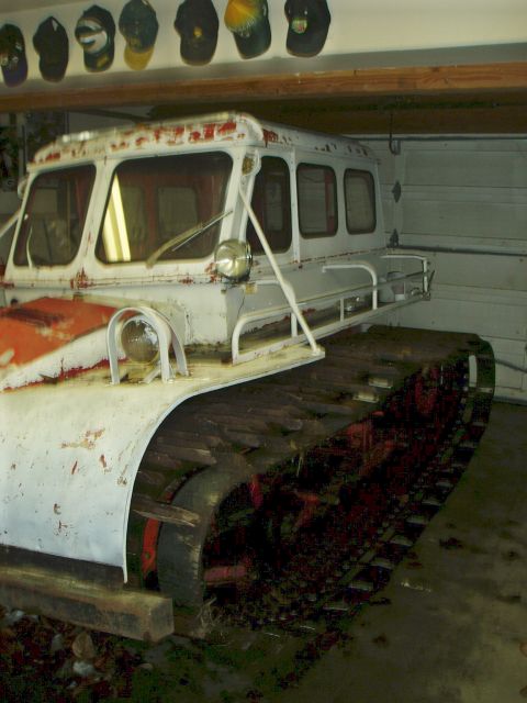 2000 Ford E350 - This tracked vehicle appears to be a snow vehicle, not a Ford E350 van.
