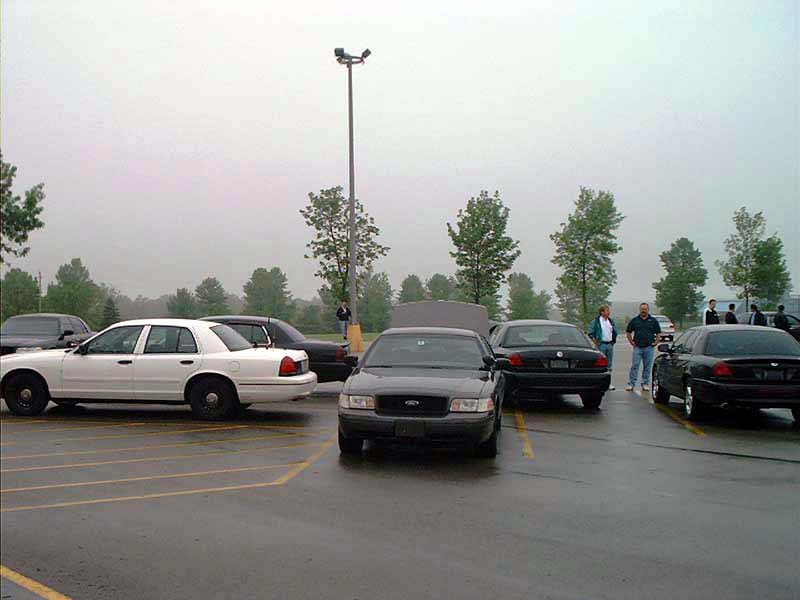 Black 2000 Ford Crown Victoria parked in a lot