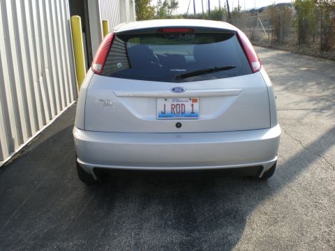 2003 Ford Focus - Rear view of a silver 2003 Ford Focus hatchback with an Illinois license plate.