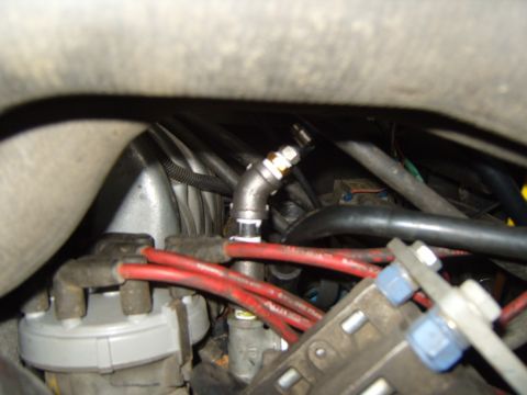 1989 Ford Bronco - Engine bay detail with distributor and spark plug wires visible.