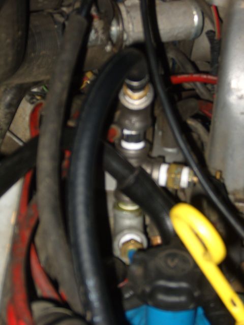 1989 Ford Bronco - This shows another T, elbow and heater hose, which allowed me to instal both gages into the flow of coolant because the hose on top is rout…