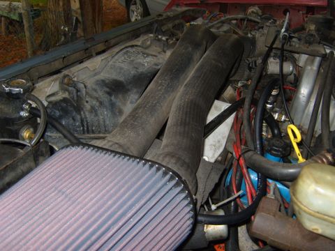 1989 Ford Bronco - this shows the routing of the hose from the T/elbow to the rad.