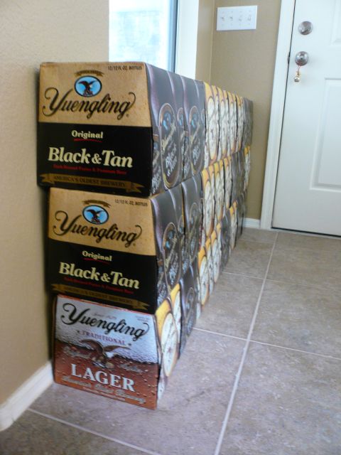 1996 Ford Probe - Several cases of Yuengling beer are stacked near a doorway.