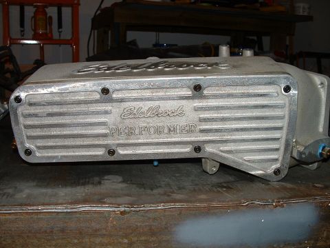 1995 Ford Bronco - Close-up of an Edelbrock Performer intake manifold, likely for a V8 engine.
