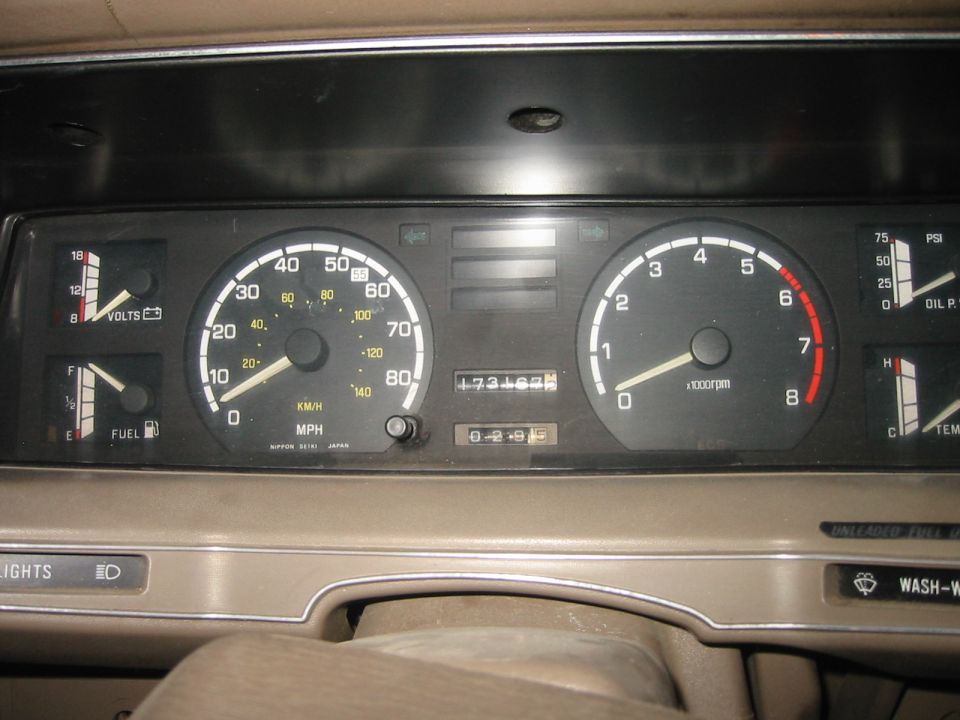 Dashboard gauge cluster showing 80 MPH speedometer, tachometer, and odometer reading 173167
