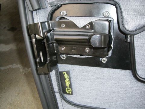 1995 Ford Bronco - Close-up of a vehicle door latch mechanism with a Bestop tag visible.