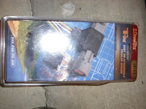 1995 Ford Bronco - Packaging for a Draw-Tite trailer wiring harness, labeled for a 1995 Jeep Wrangler.