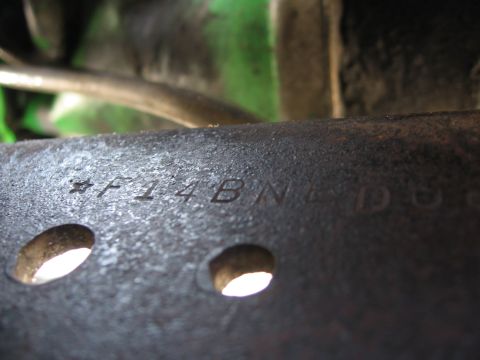 1979 Ford F-150 - A close-up view of a metal component with stamped identification numbers.