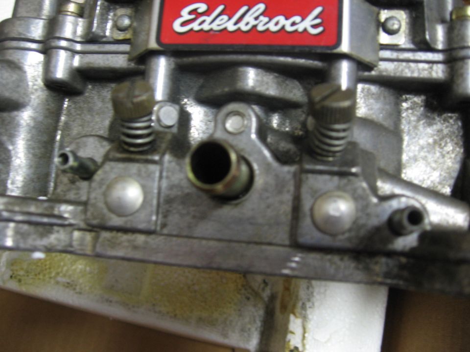 Edelbrock carburetor with visible text