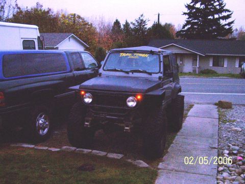 1988 Suzuki Samurai - Modified 1988 Suzuki Samurai with large tires and a custom front bumper.
