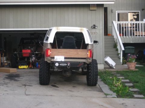 1989 Ford Bronco - This modified Ford Bronco has a custom wooden bed and appears to be from the early 1980s.