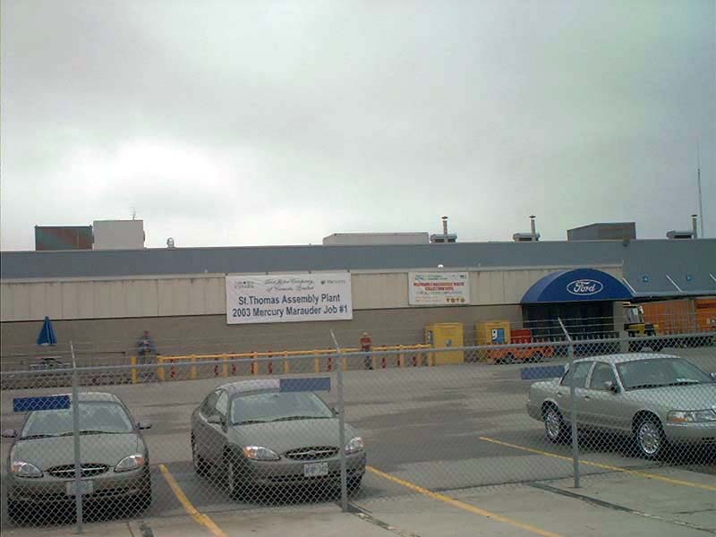 Silver 2003 Mercury Marauder parked outside a Ford assembly plant