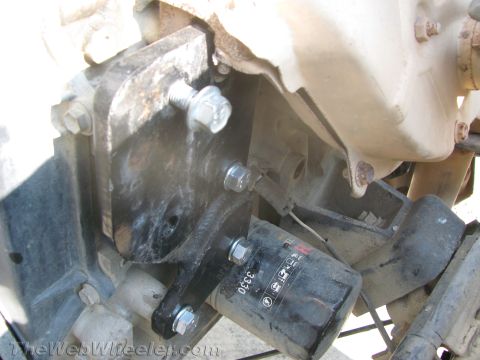 1987 Suzuki Samurai - Close-up of an engine part, showing an oil filter mounted to the engine block.