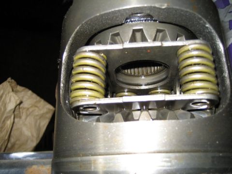 1995 Ford Bronco - Internal view of a differential assembly, showing gears and springs.