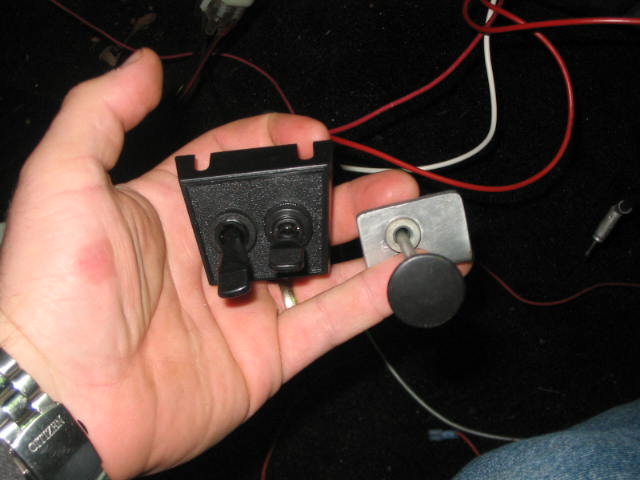 New controls for the system: one on/off toggle switch, one on/off/on toggle, and my old manual-choke cable to control the temperature door.