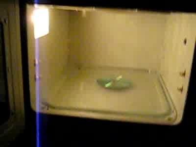 1988 Mercury Grand Marquis - destroying a CD with a Microwave.