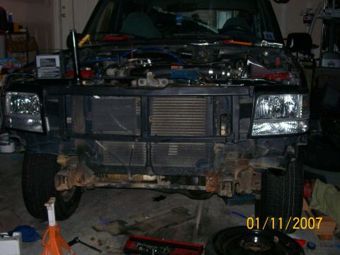 1996 Ford Bronco - This truck's front end is disassembled, revealing the radiator and engine bay. A date stamp indicates the photo was taken on January 11, 20…