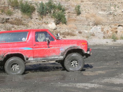 1985 Ford Bronco - playing in the mud 2 wheel drive.