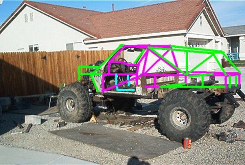 1982 Toyota 4Runner - Custom off-road vehicle under construction with a prominent roll cage structure.