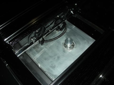 1998 Ford Crown Victoria - Polished aluminum fuel cell with a billet filler cap and braided line mounted in a black-finished trunk compartment.