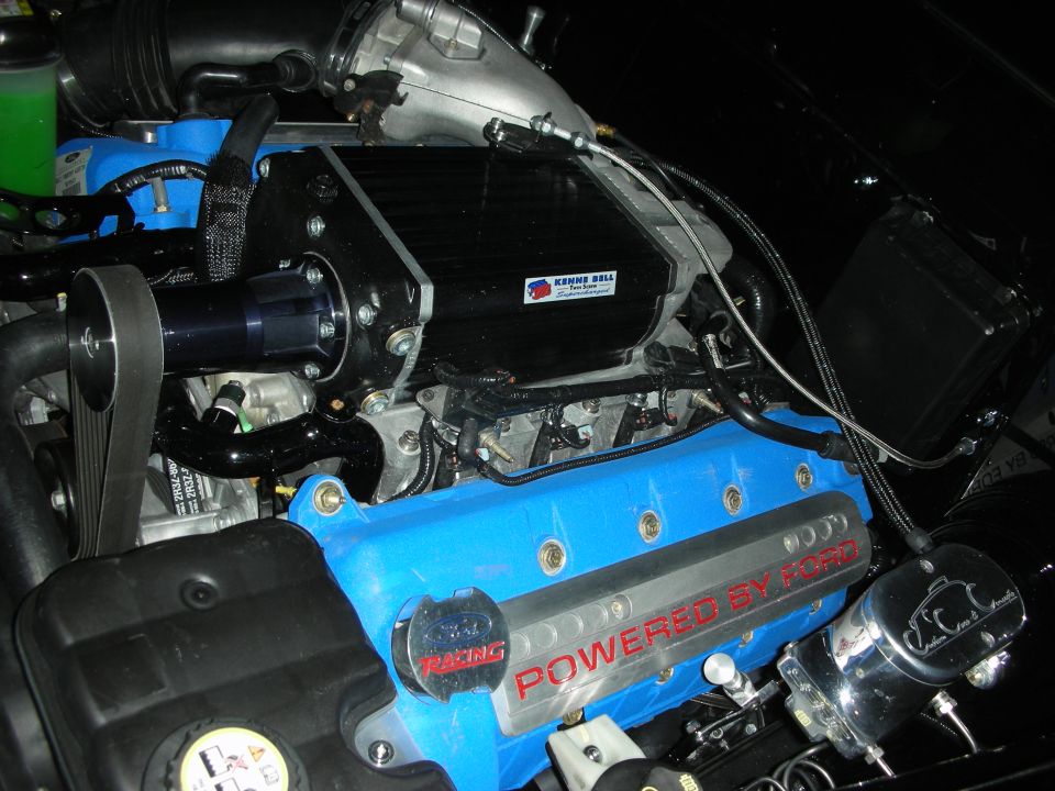 Blue Powered by Ford valve cover on a supercharged V8 with Kenne Bell blower