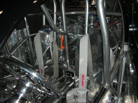 1998 Ford Crown Victoria - Custom interior with aluminum bucket seats, Simpson racing harnesses and a chrome steering wheel inside a tubular roll cage.