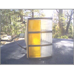 1973 Ford Ranchero - A clear and amber tail light assembly is shown, with the SuperMotors logo visible at the bottom.