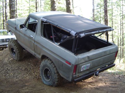 1978 Ford Bronco - This modified Ford Bronco is shown off-road with a soft top and lifted suspension.