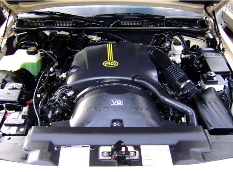 1996 Mercury Grand Marquis - Engine bay of a 1996 Mercury Grand Marquis, showing the V8 4.6L engine and associated components.