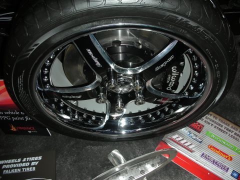 Chrome multi-spoke wheel with Wilwood brake caliper and Falken tire