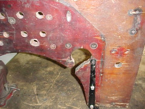 1913 Ford Model T - Original firewall showing the steering column hole and firewall to frame bracket.
