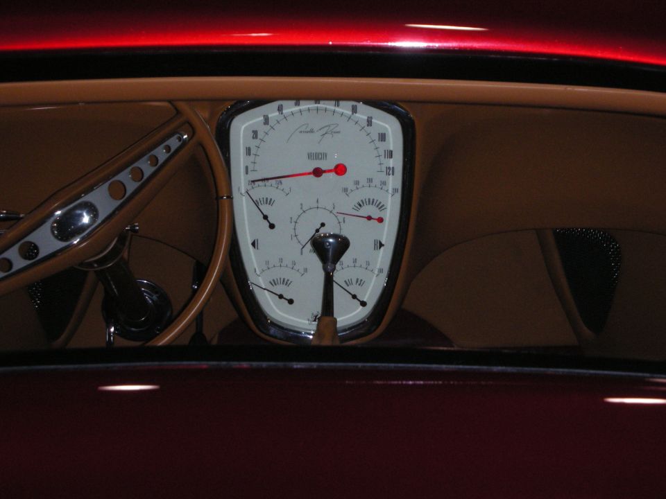 Custom dashboard with oval gauge cluster and banjo steering wheel