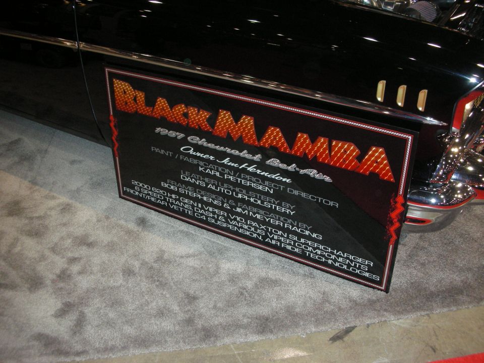 Black Mamba 1957 Chevrolet Bel Air display plaque on a black car