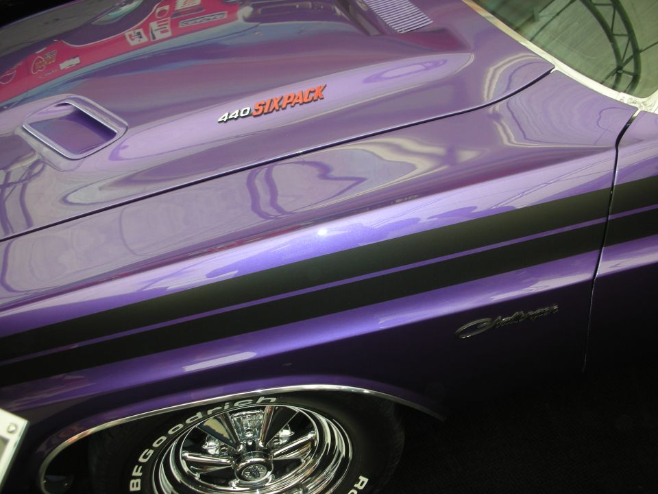 Purple muscle car fender with 440 Six Pack callout and Challenger badge