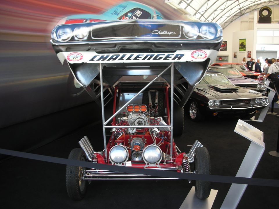 Front-engine dragster with tilted Challenger body and exposed blown engine