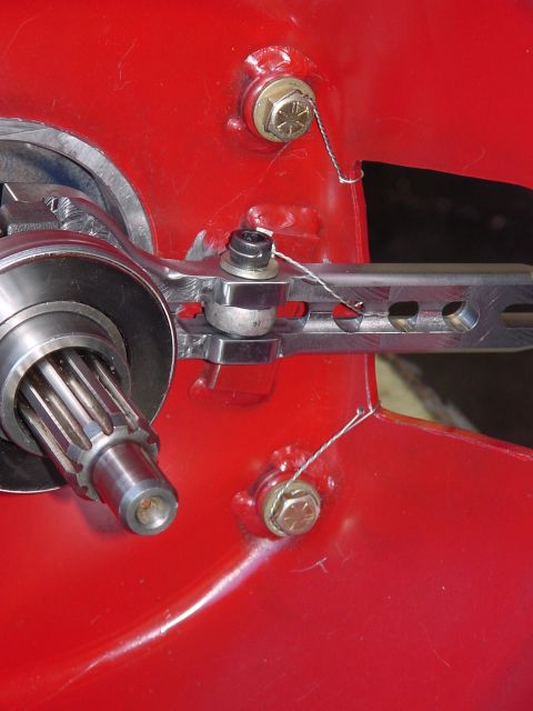 1979 Ford Bronco - Detail of a clutch fork assembly, showing the splined shaft and securing hardware with safety wire.