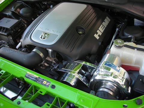 1998 Ford Crown Victoria - 5.7L HEMI V8 engine bay fitted with a polished ProCharger supercharger, set behind a bright green-painted radiator core support.