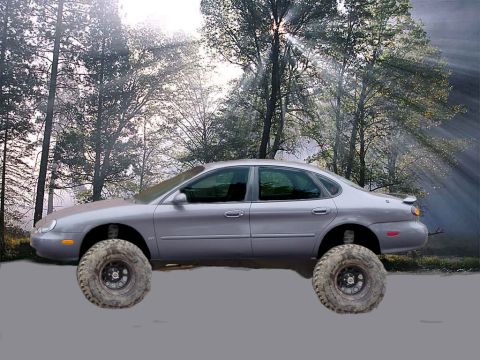1996 Ford Taurus - This 1996 Ford Taurus has been modified with a lifted suspension and large off-road tires, giving it a unique, appearance.
