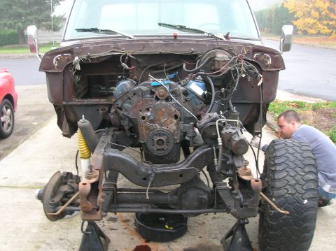1978 Ford F-250 - Truck chassis with engine bay open, showing the engine and front suspension components removed.
