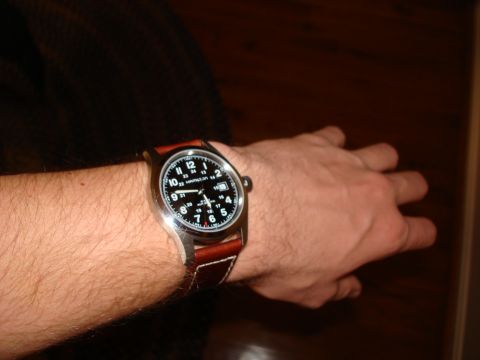 1994 Ford Bronco - A close-up of a Hamilton watch on a person's wrist.